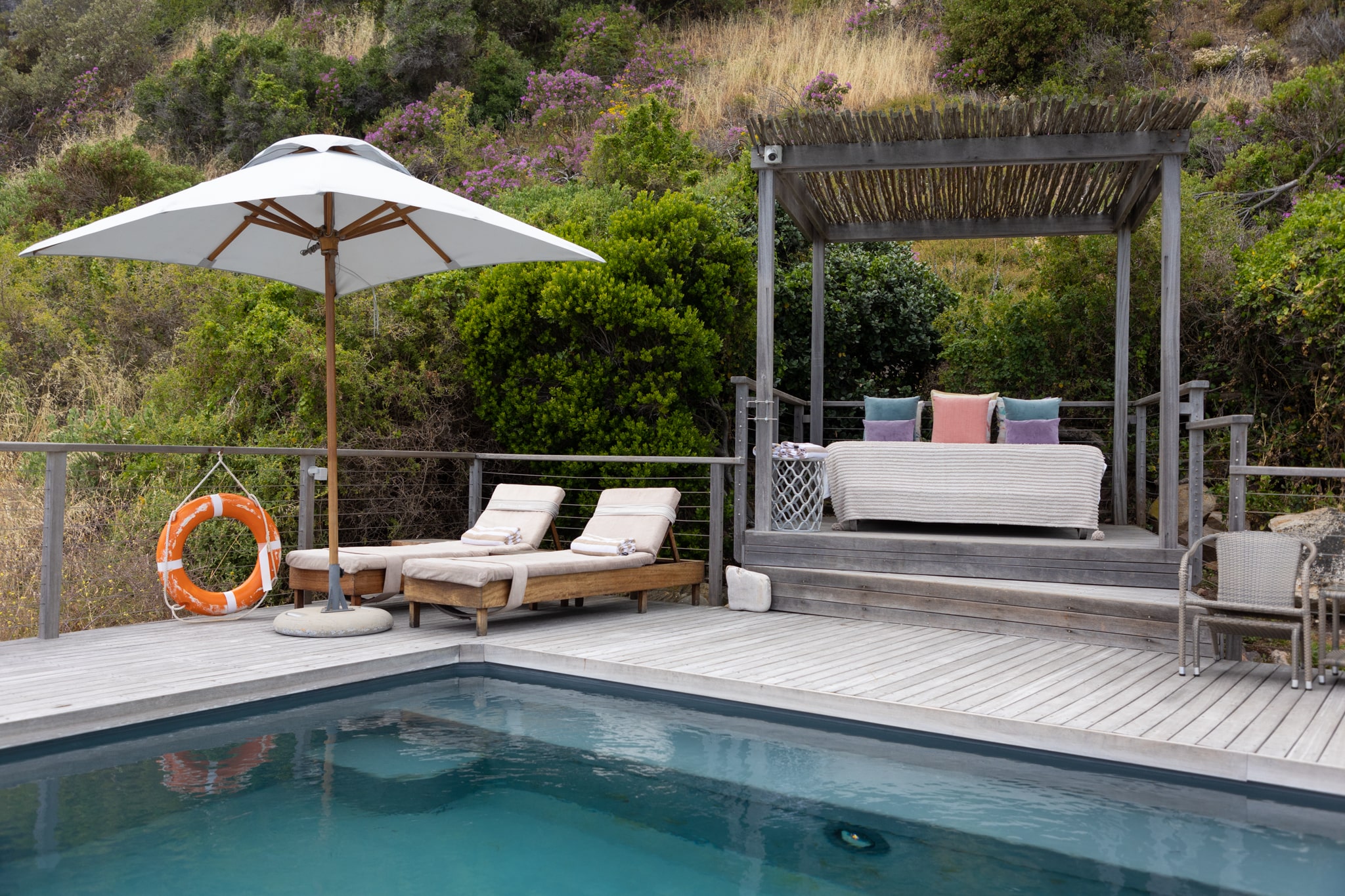 A Pool Deck, and the Sentinel Across the Bay.