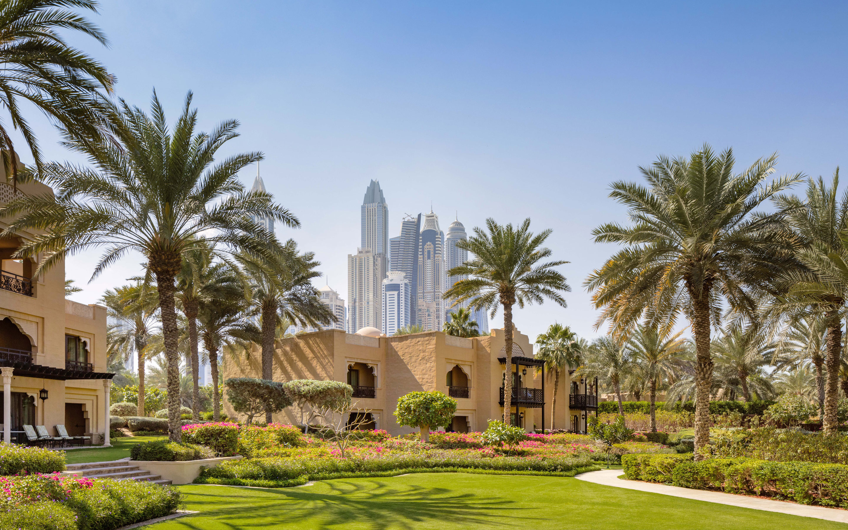 65 acres of landscaped gardens with the Dubai skyline beyond