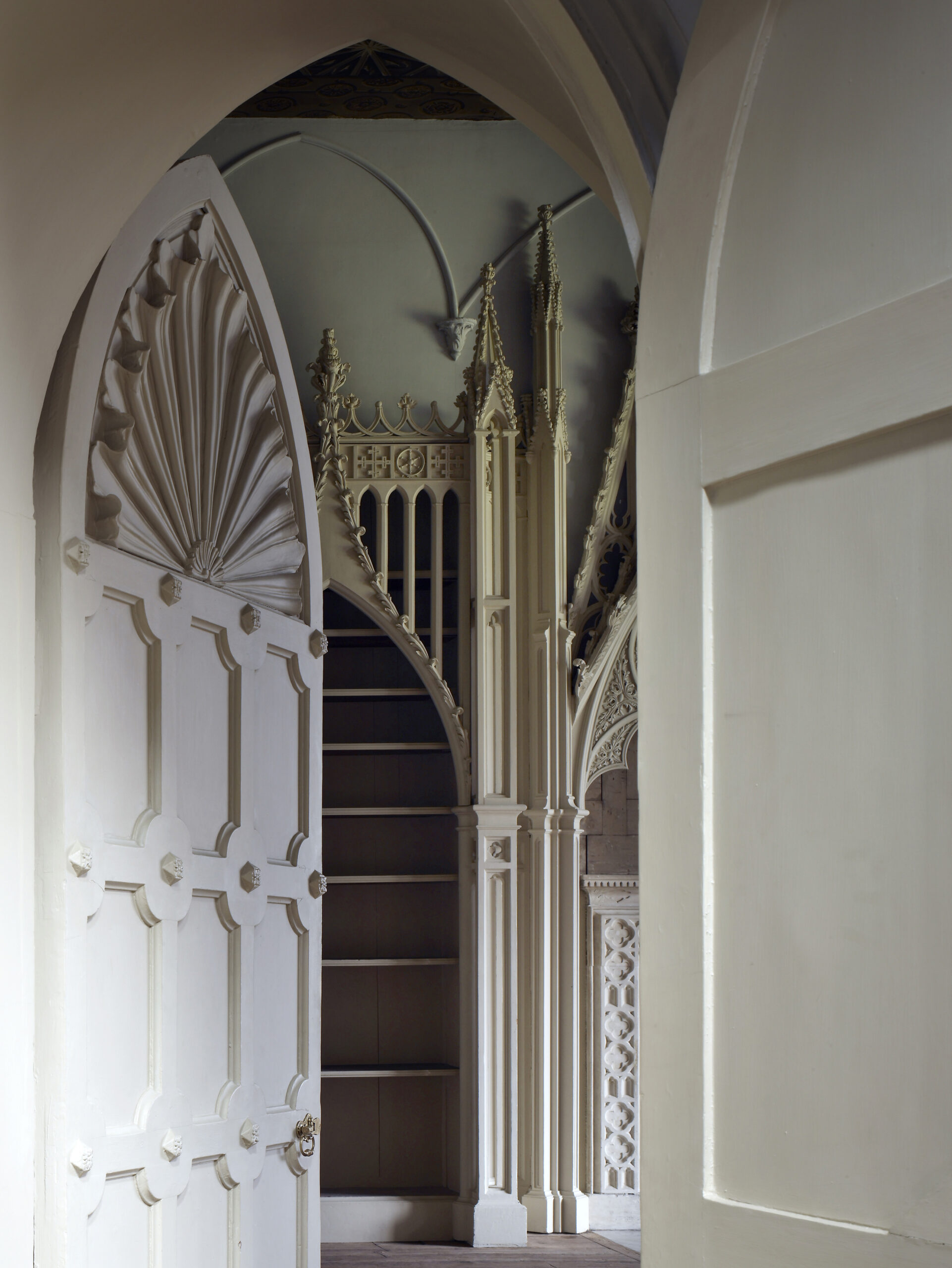 The Library at Strawberry Hill, its Gothic-arched bookcases and painted ceiling