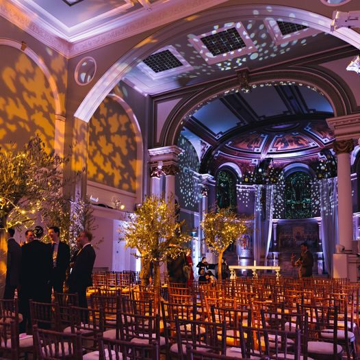 A gold-lit celebration with starlight across the vaulted ceiling