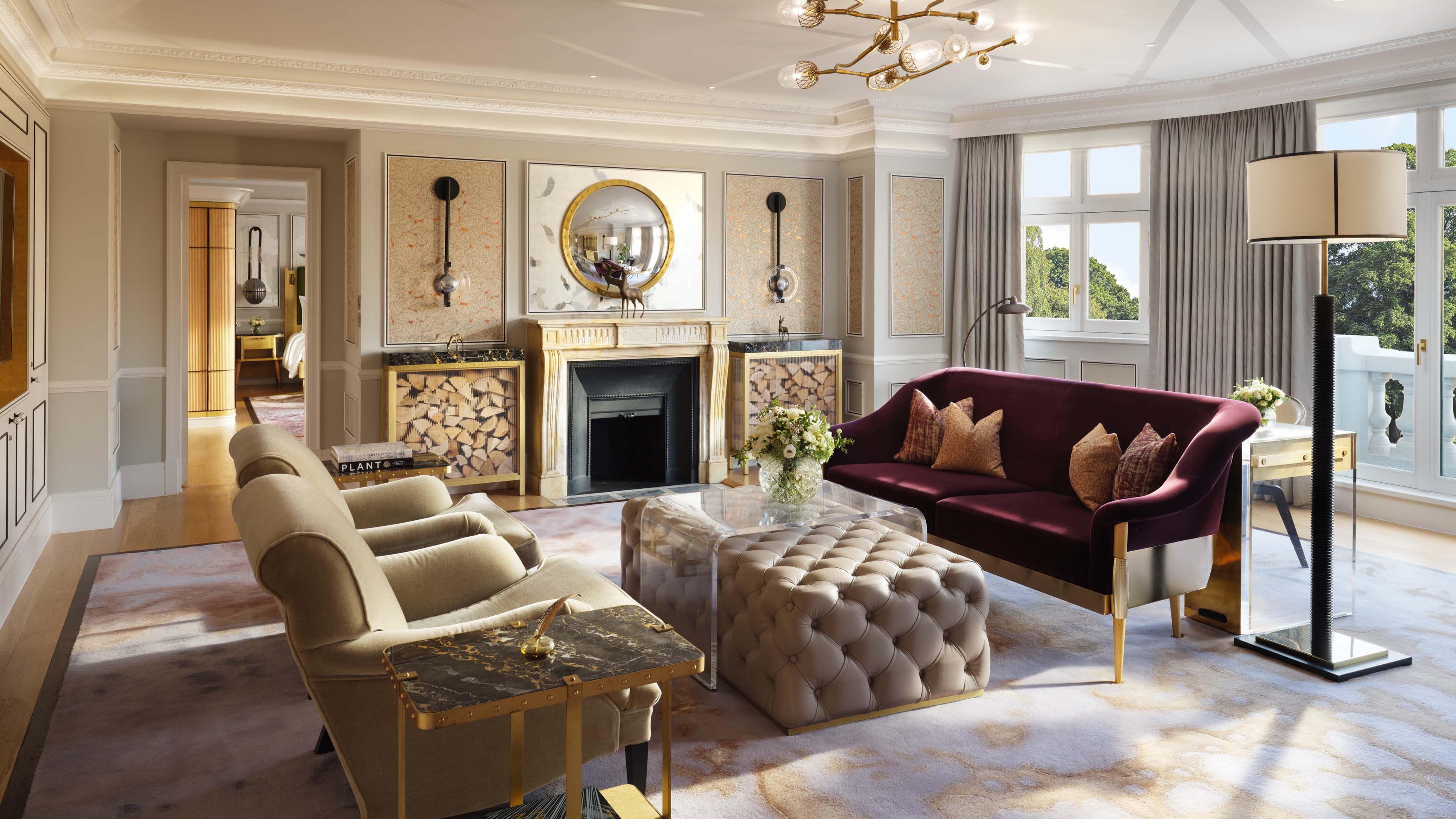 Suite drawing room, burgundy velvet and marble fireplace, Hyde Park beyond