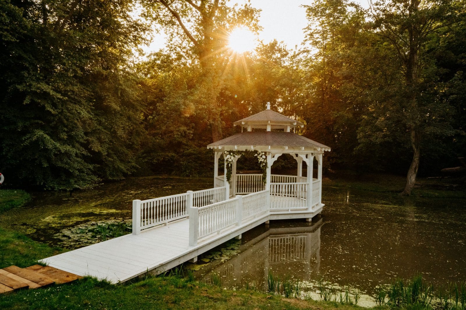 The Lake Pavilion and its white timber bridge at sunrise