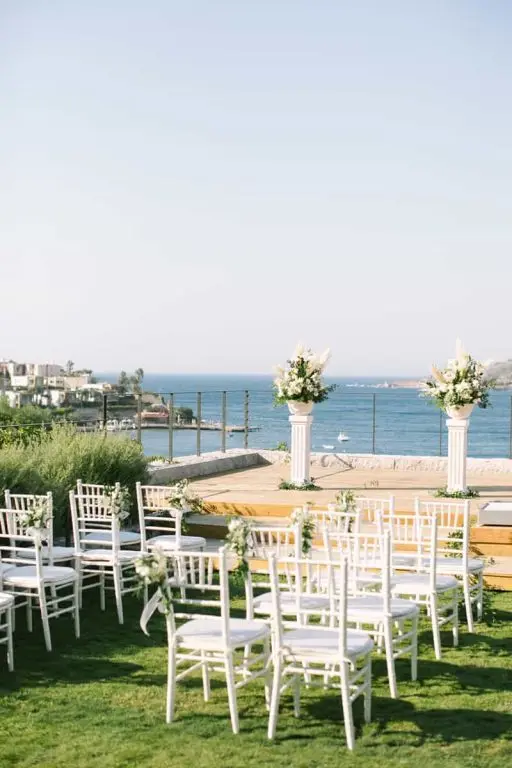 A sea-view suite opening to a terrace above the beach