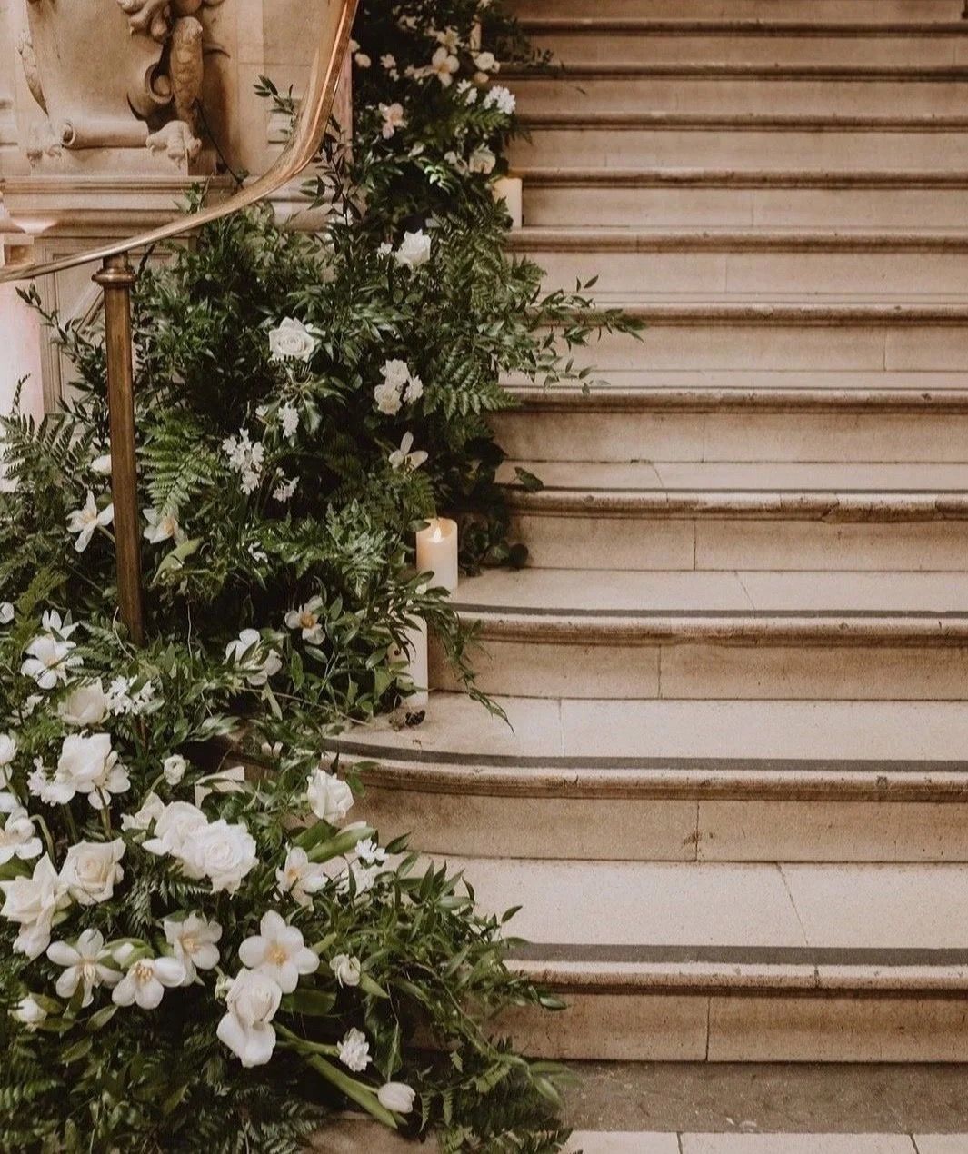 White blooms and candlelight along the marble staircase, Oxford Town Hall, Foxgloves and Roses, Wantage, England