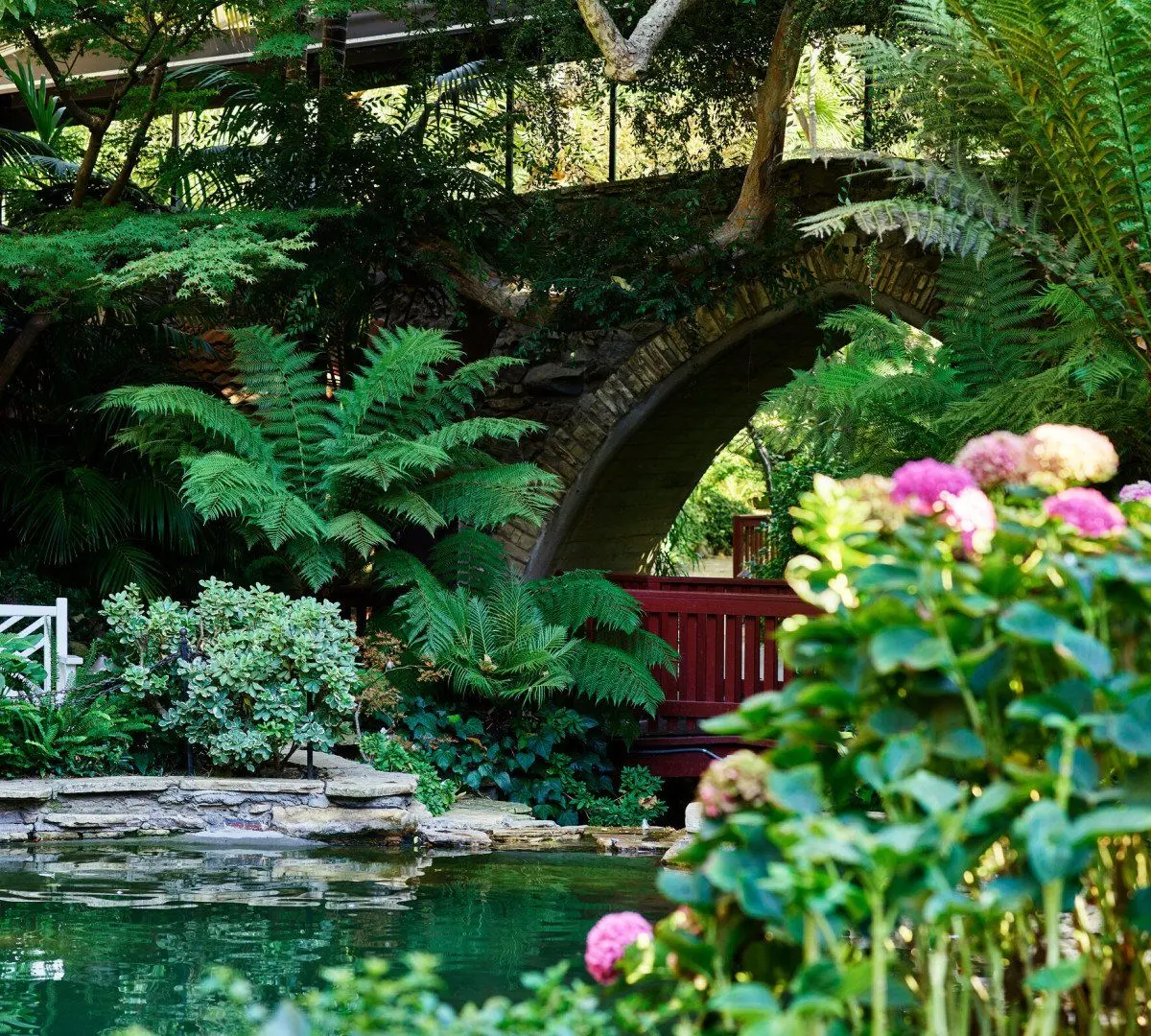 Swan Lake, the grotto and stone bridge, Hotel Bel-Air, Los Angeles, United States