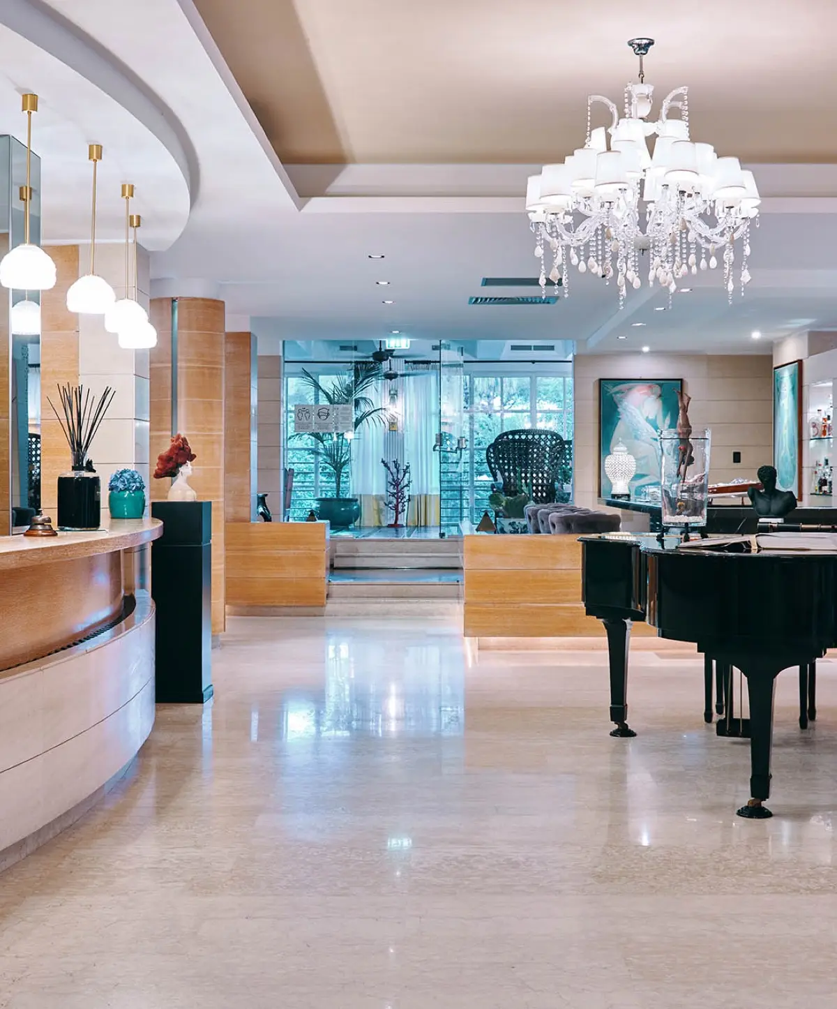 The grand-piano lobby, opening to the pool