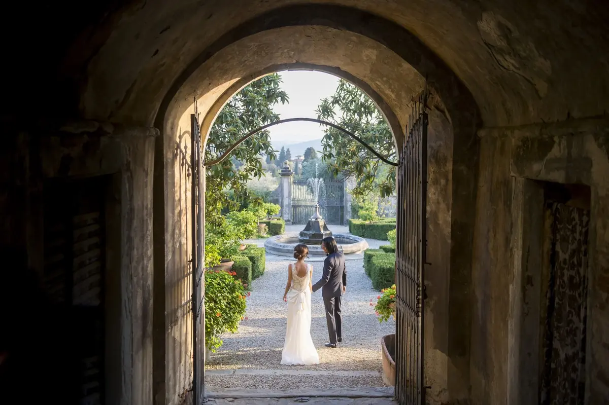 Through the arch into the formal garden, walking towards the fountain