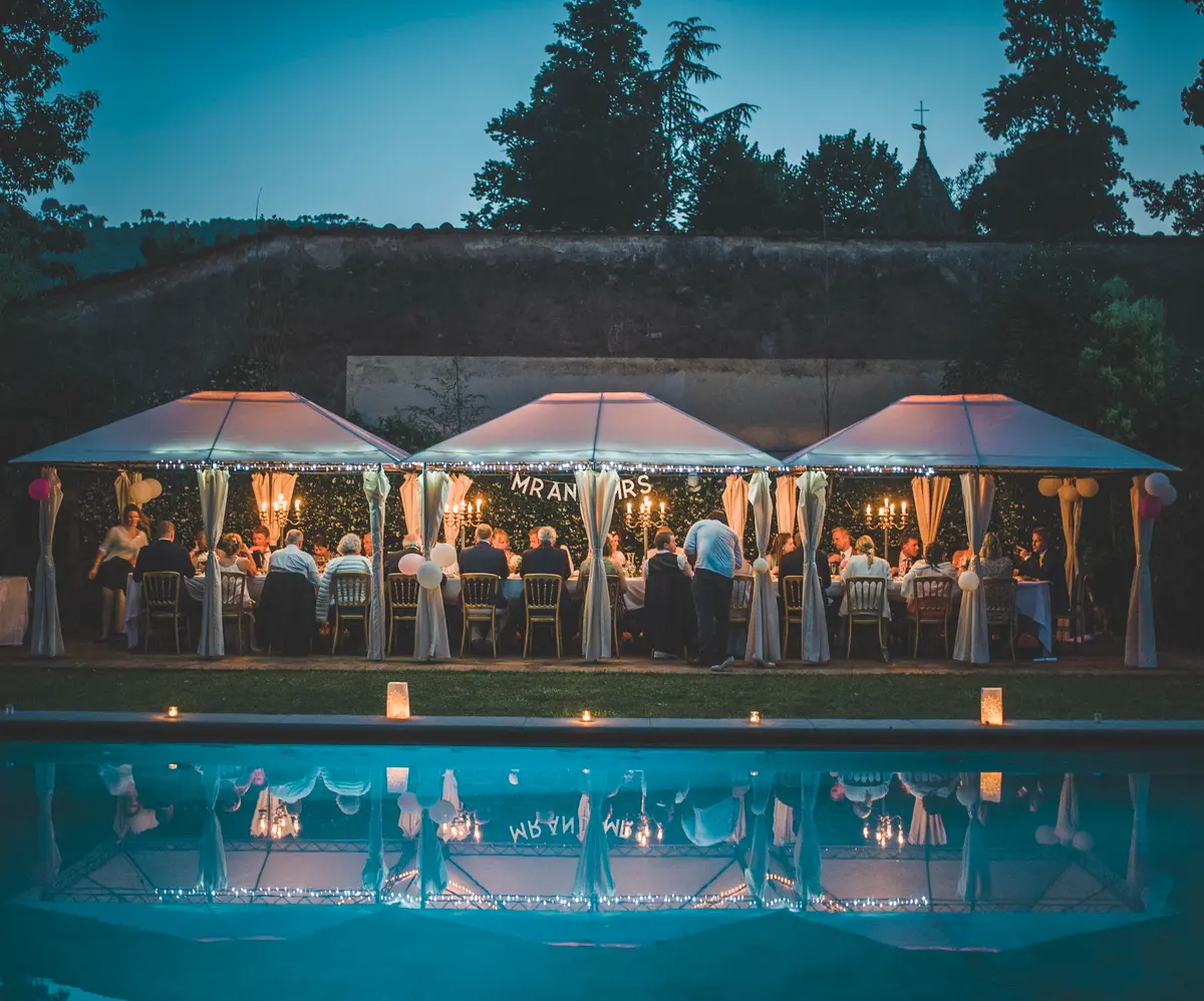 An evening reception by the pool at Villa Michaela, Vorno, Lucca
