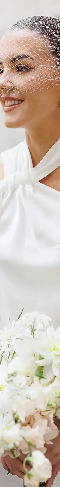 Emily's bridal portrait, a bouquet of white and cream blooms, The Ned