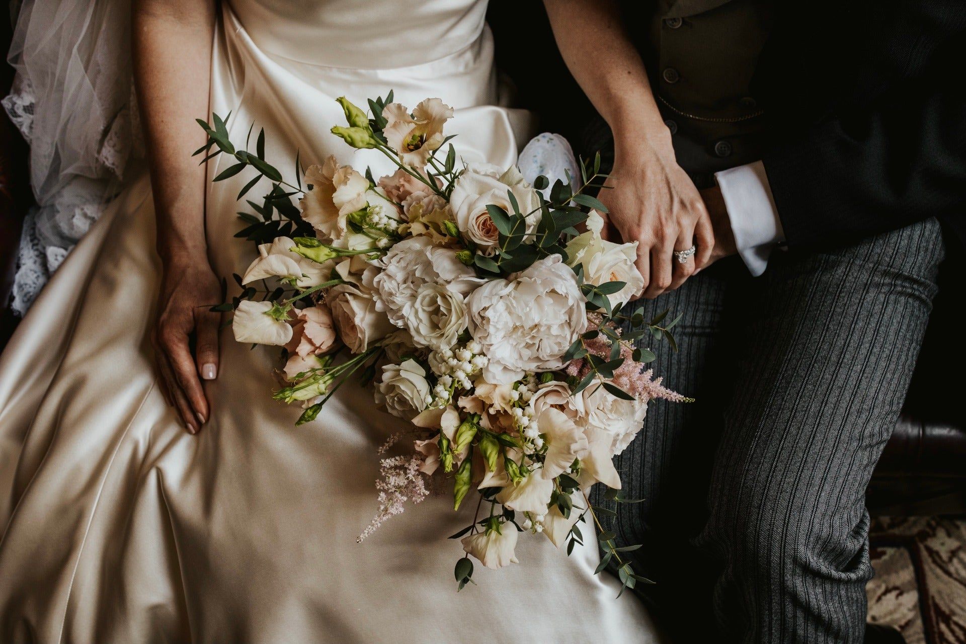 A bridal bouquet of white and blush garden rose, an intimate London city wedding