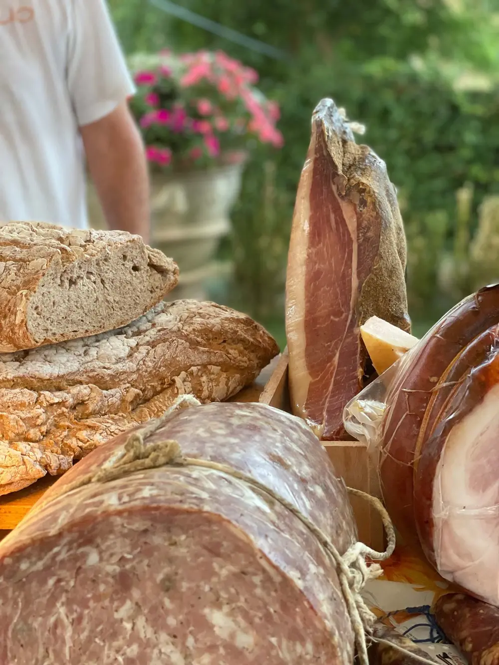 A board of estate bread and salumi