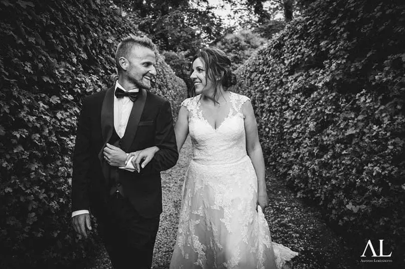 Through the hedge-lined path, laughing, Alfonso Lorenzetto, Treviso, Italy