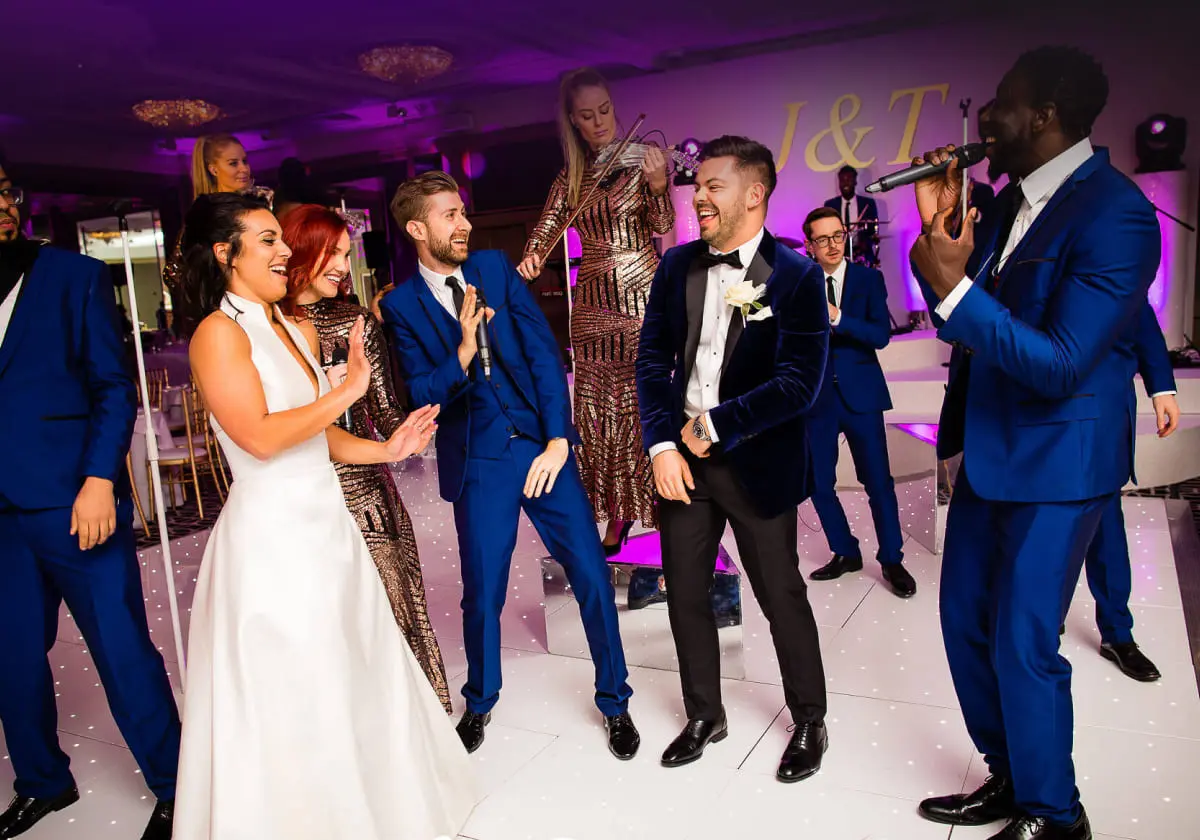 The Function Band with the bride and groom on the dance floor