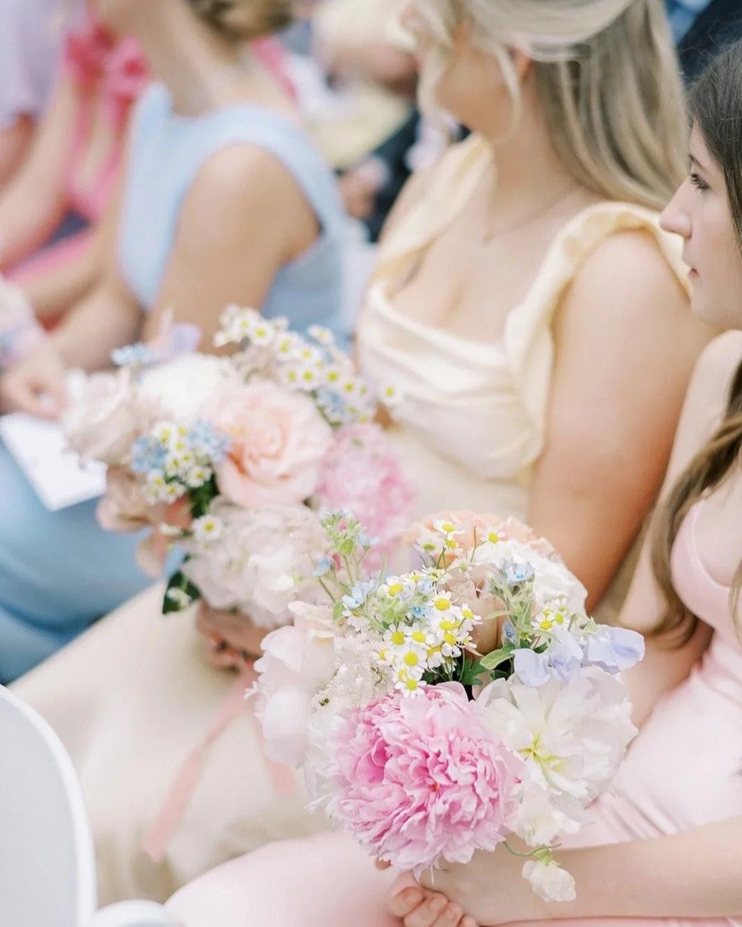 Bridesmaids' bouquets of peony, rose and chamomile