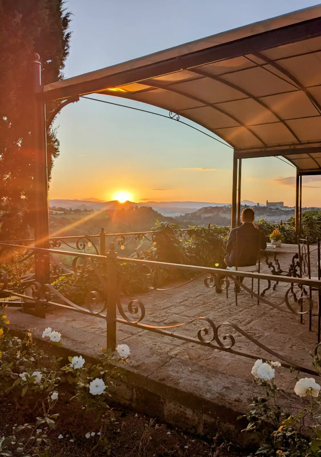 The gazebo terrace at Torre Collevento at dusk