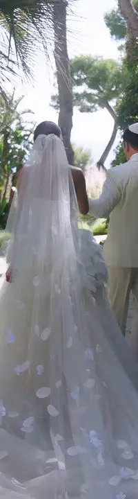 Through the garden, veiled in petals