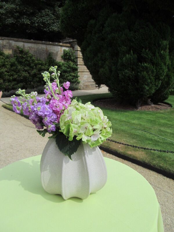A garden centrepiece of purple and green hydrangea