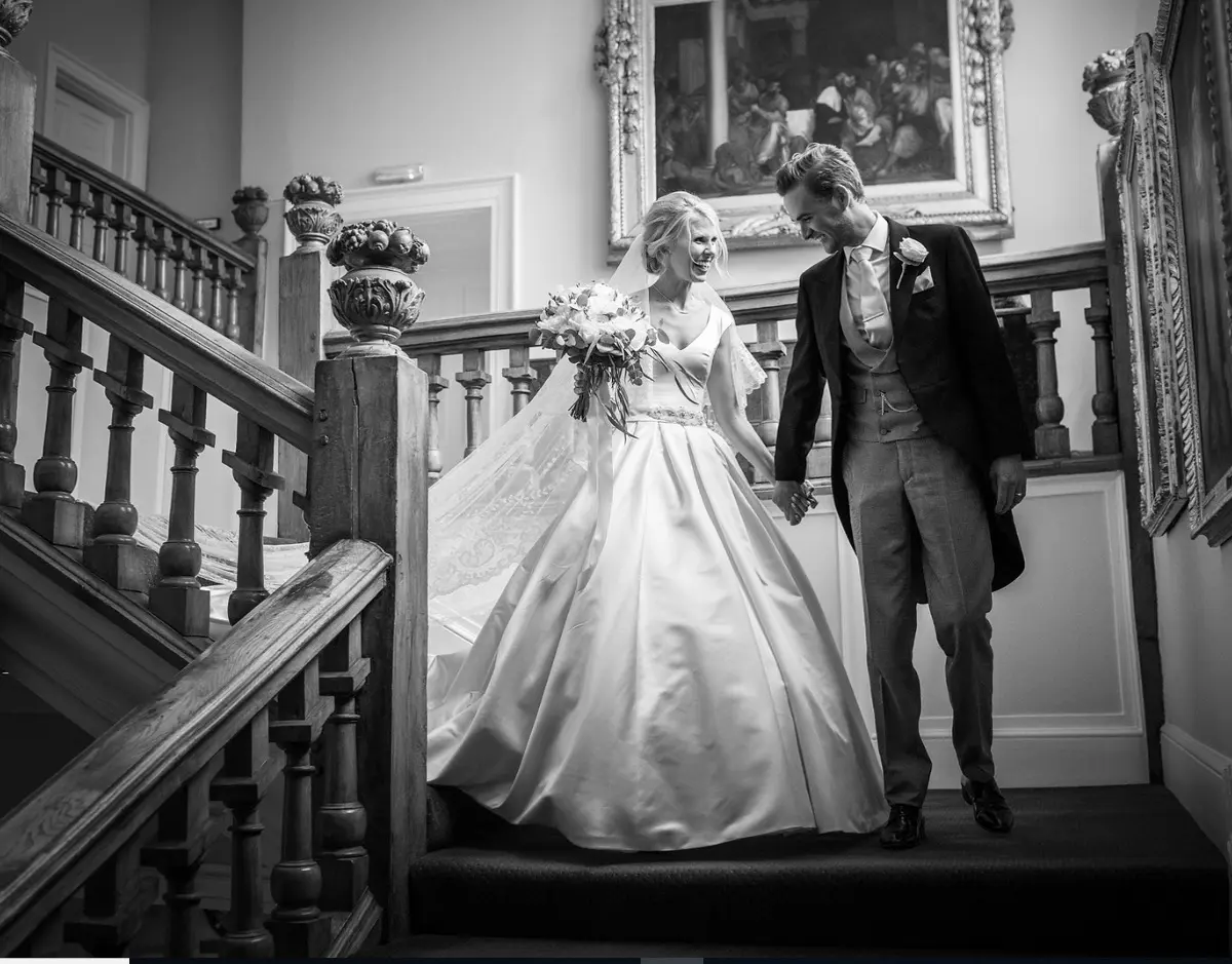 Newlyweds on the sweep of the Great Stair