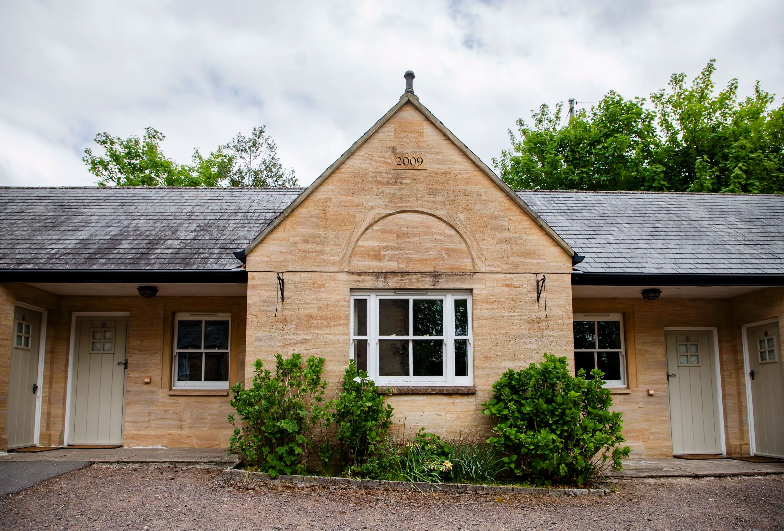 The refurbished guest rooms in the old stone buildings