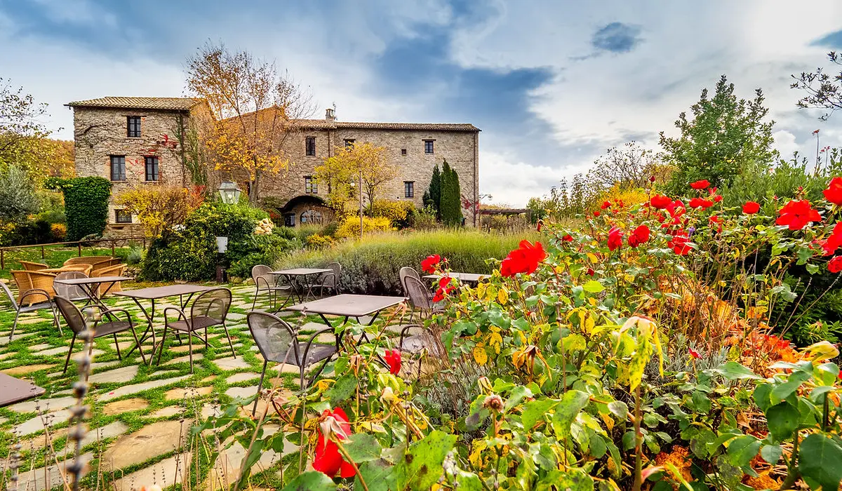 The panoramic terraces at Castello di Petrata with Assisi below