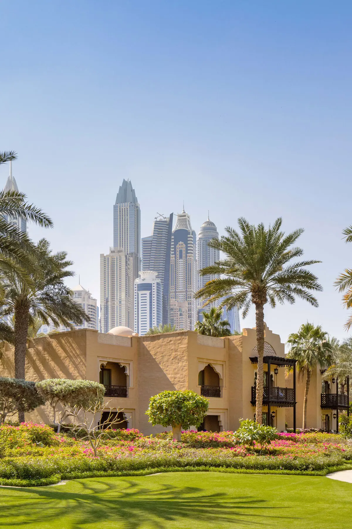 65 acres of landscaped gardens with the Dubai skyline beyond