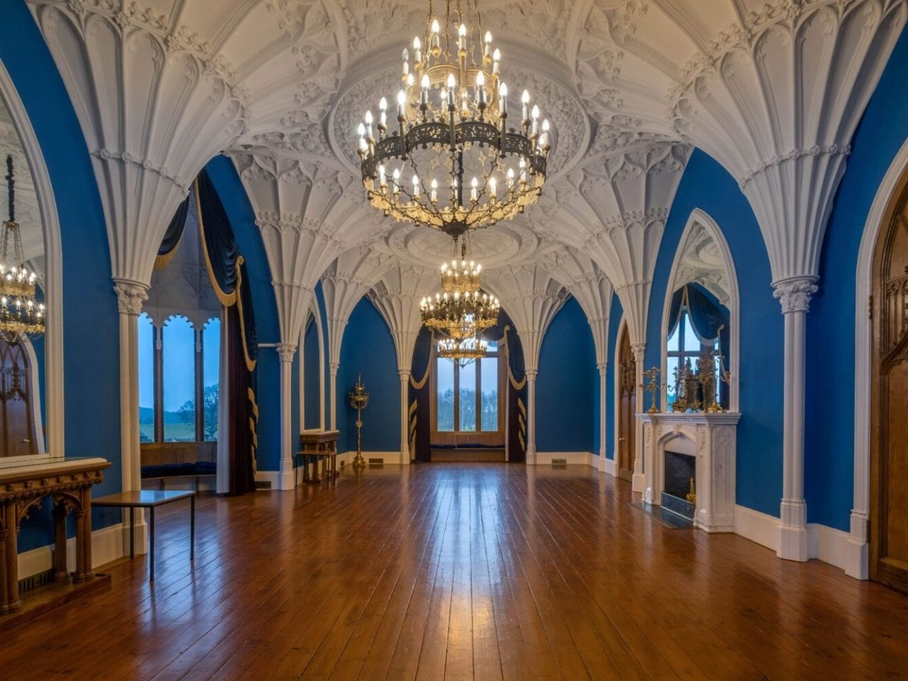 The empty Ballroom, blue Gothic arches and a polished wood floor