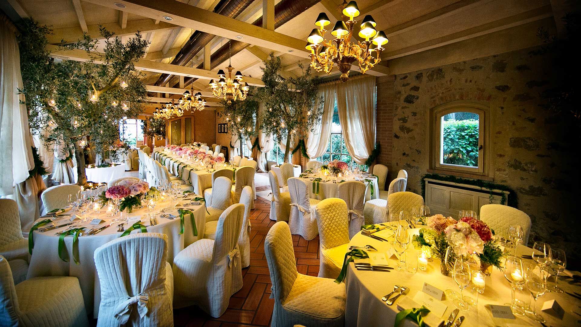 A wedding reception beneath a loggia on a Maremma estate