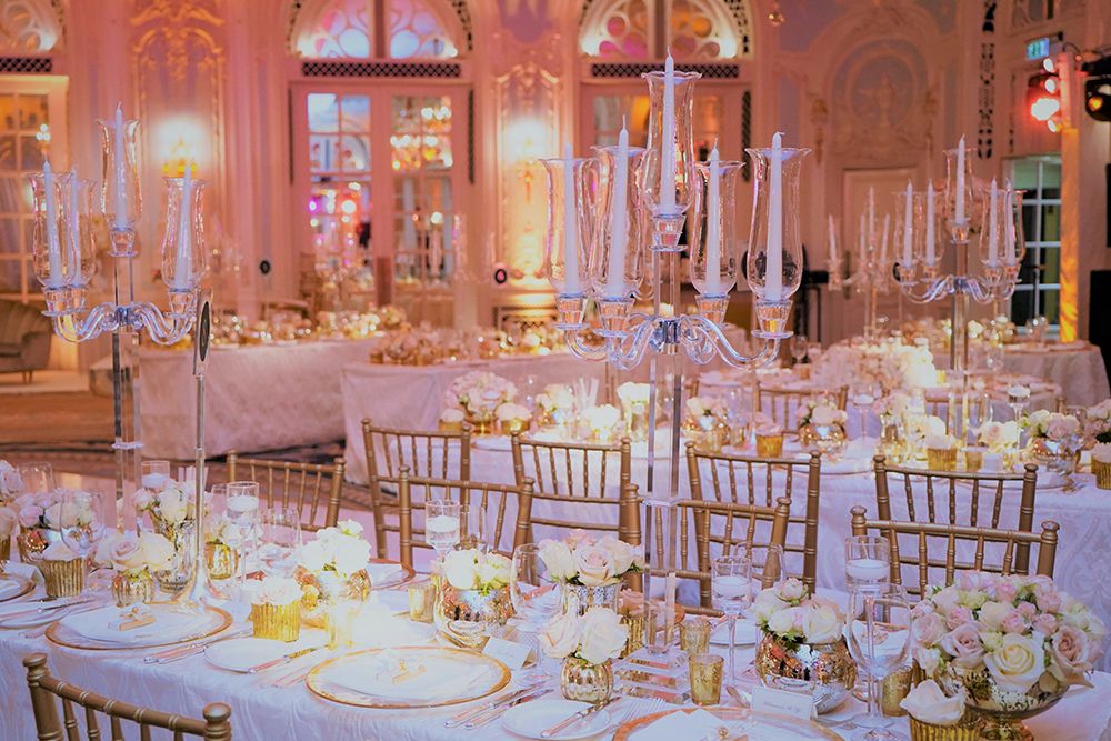 A candelabra dinner, lit in pink