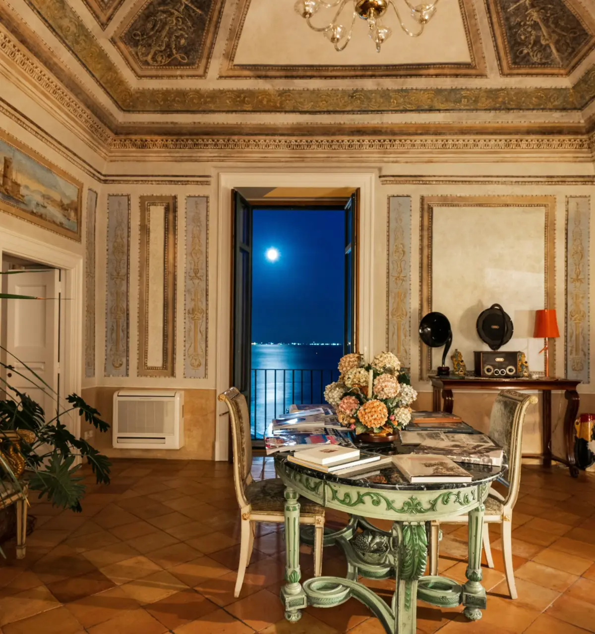 The grand frescoed salon at Palazzo Suriano