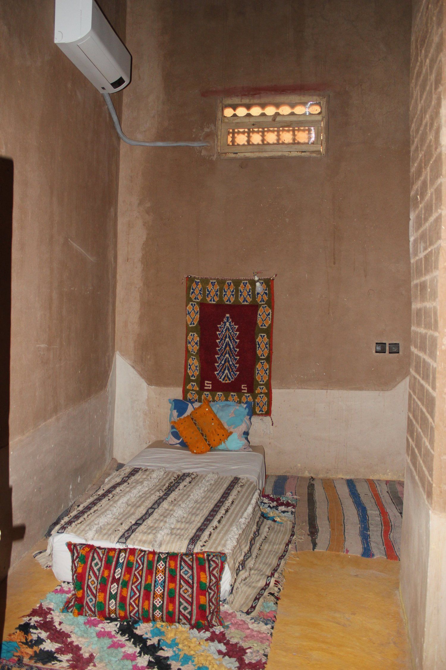 A sitting room, dressed with Berber rugs