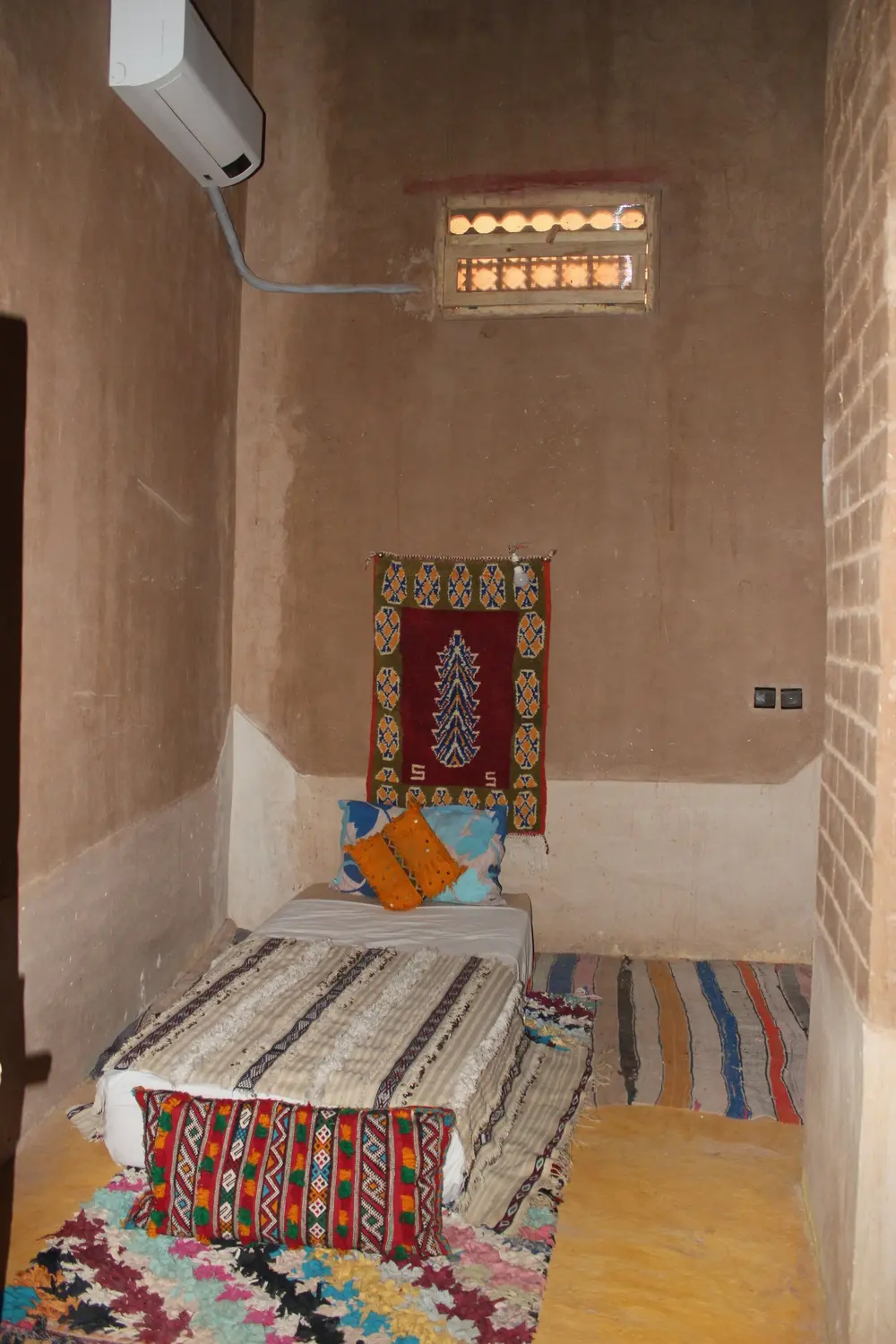 A sitting room, dressed with Berber rugs
