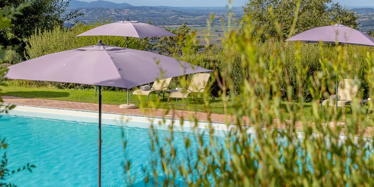 The panoramic outdoor pool at ColleMassari, Maremma