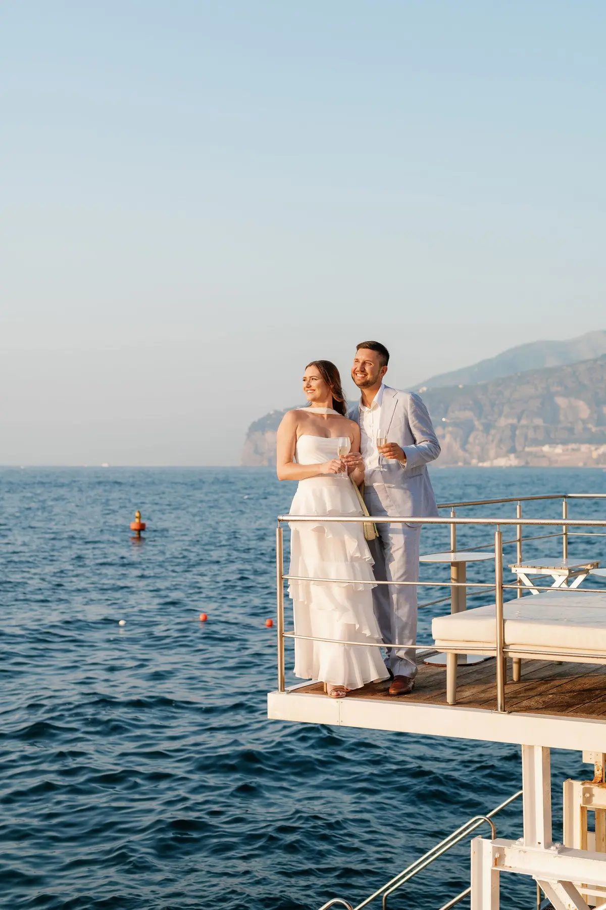 Champagne on a private jetty over the sea below Sorrento