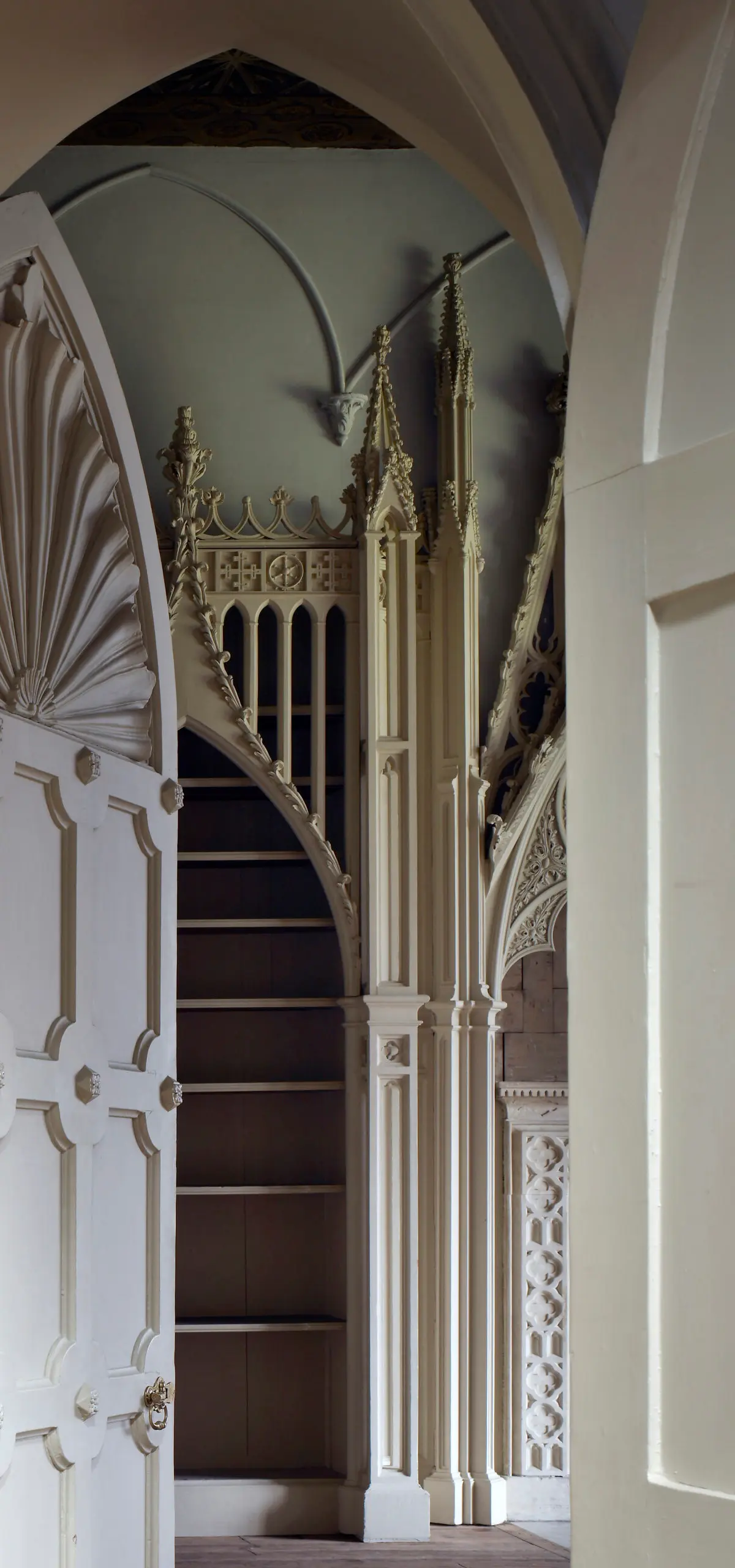 The Library at Strawberry Hill, its Gothic-arched bookcases and painted ceiling