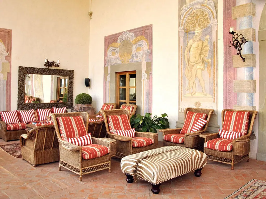 The frescoed Renaissance loggia of Villa Mangiacane with Chianti views
