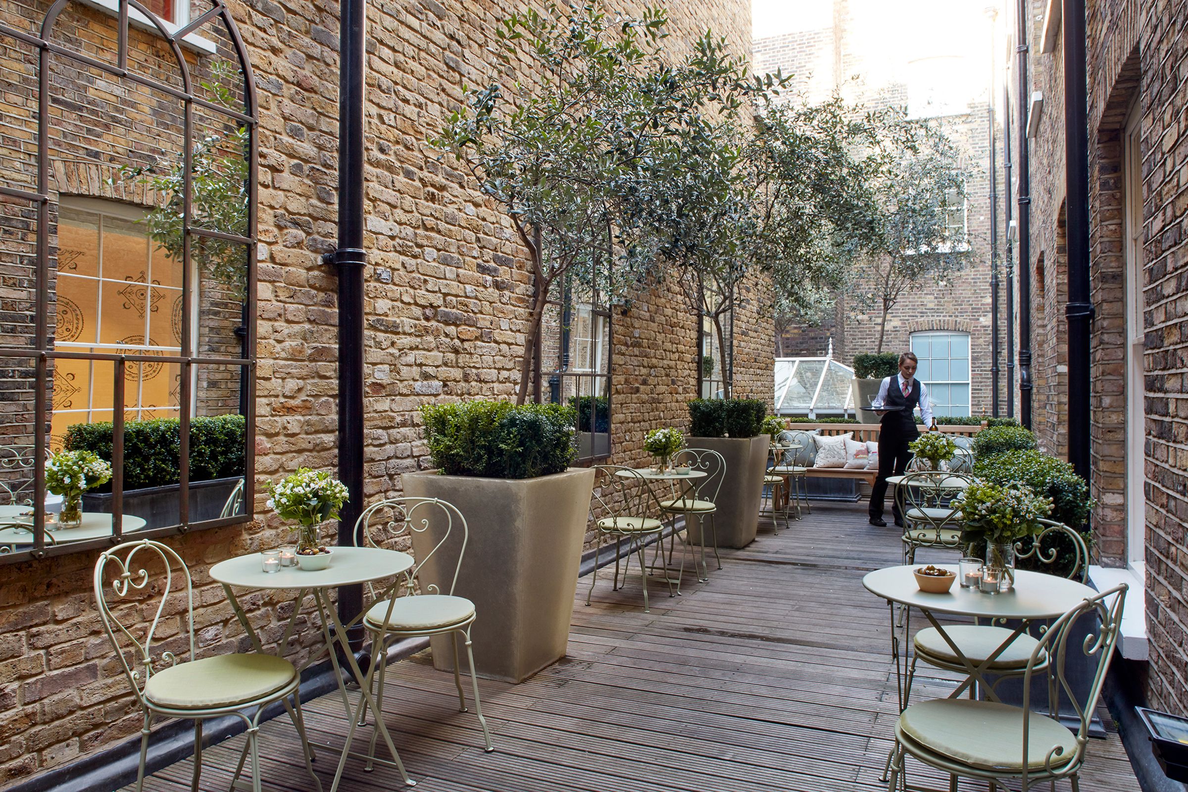 The first-floor terrace, with tables above the West End