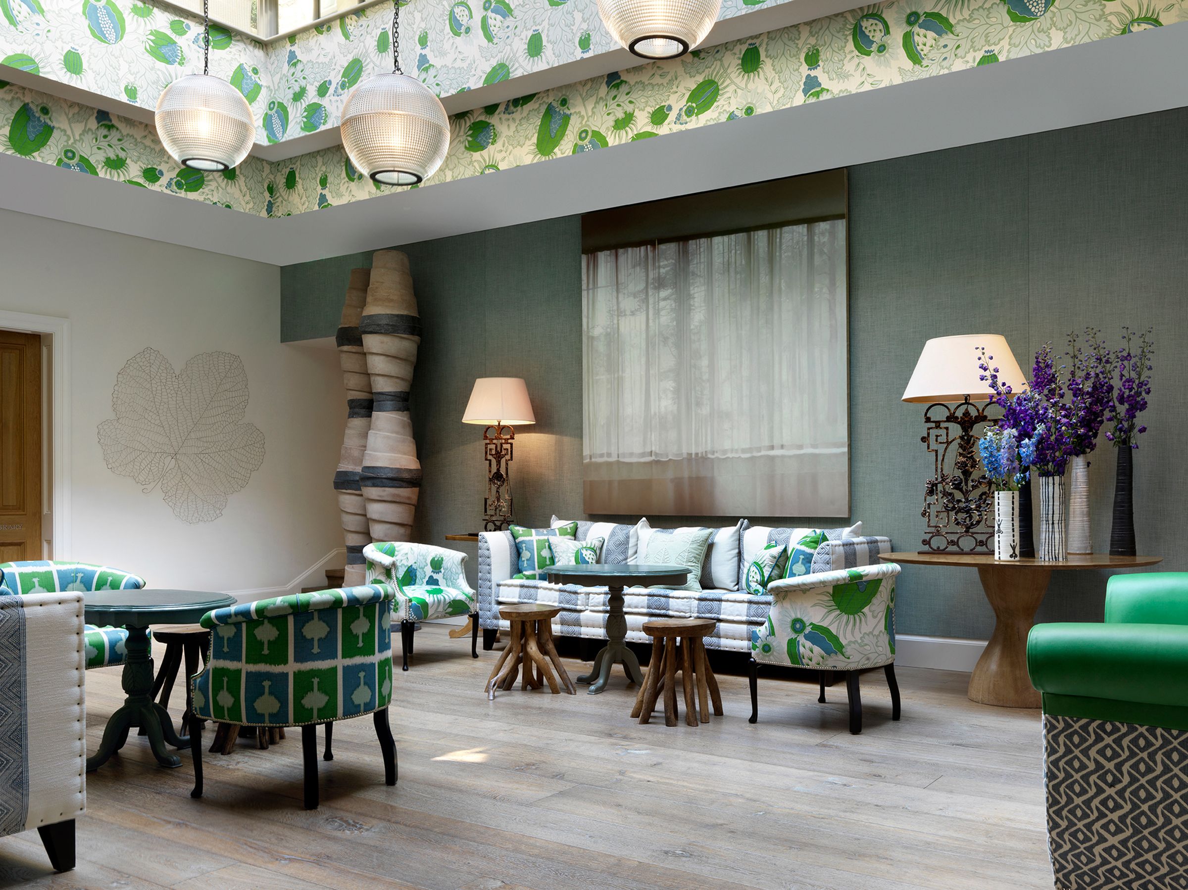 The Conservatory lounge, beneath a leaf-painted ceiling