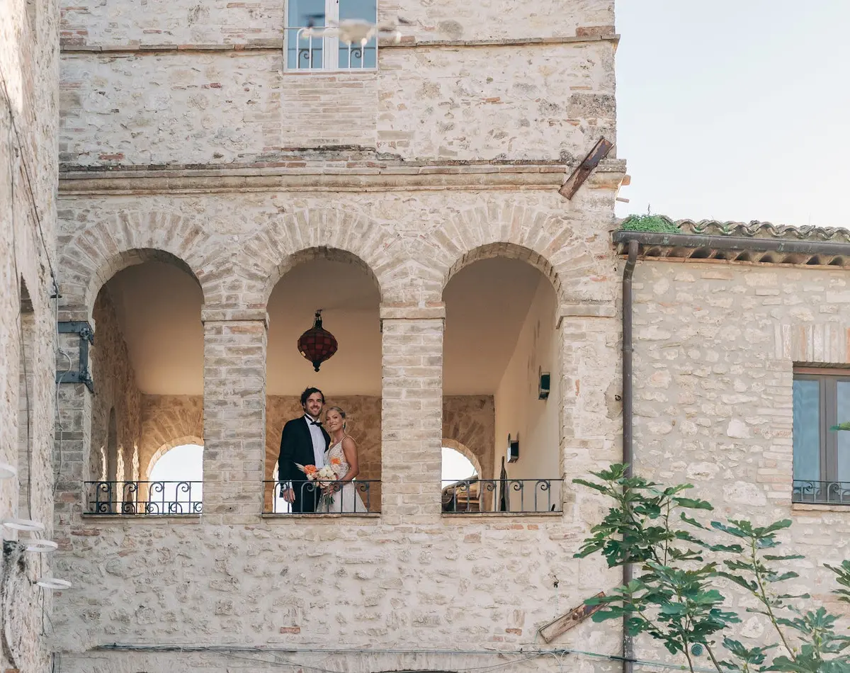 The stone loggia and arches of Castello di Montignano, Umbria