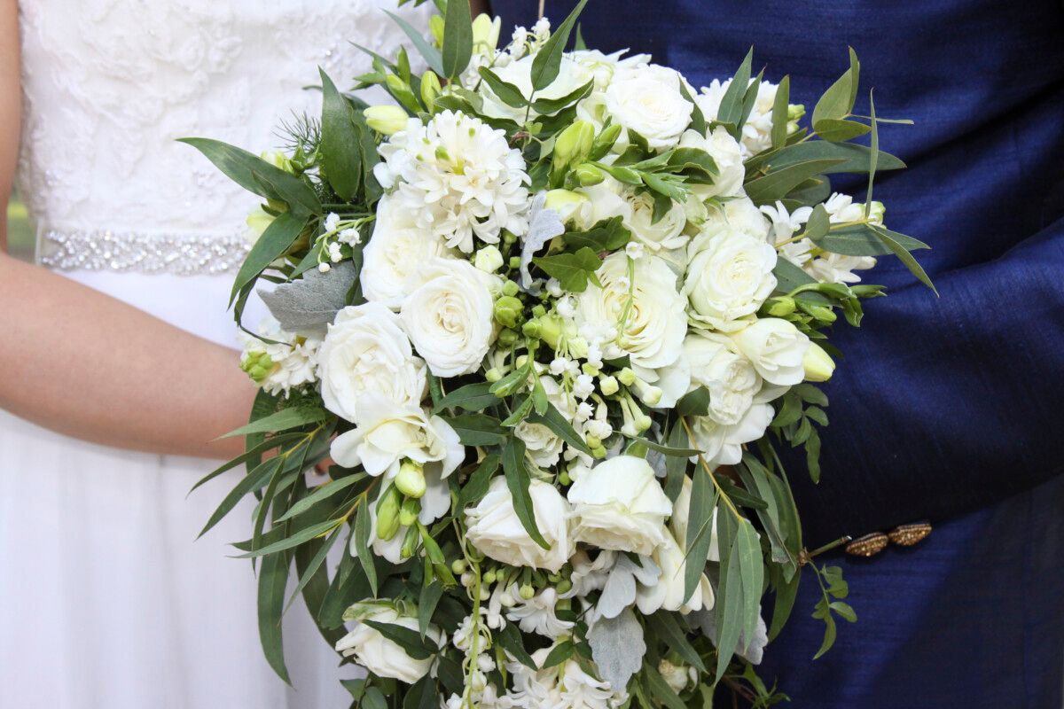 A bride's bouquet of white rose and freesia