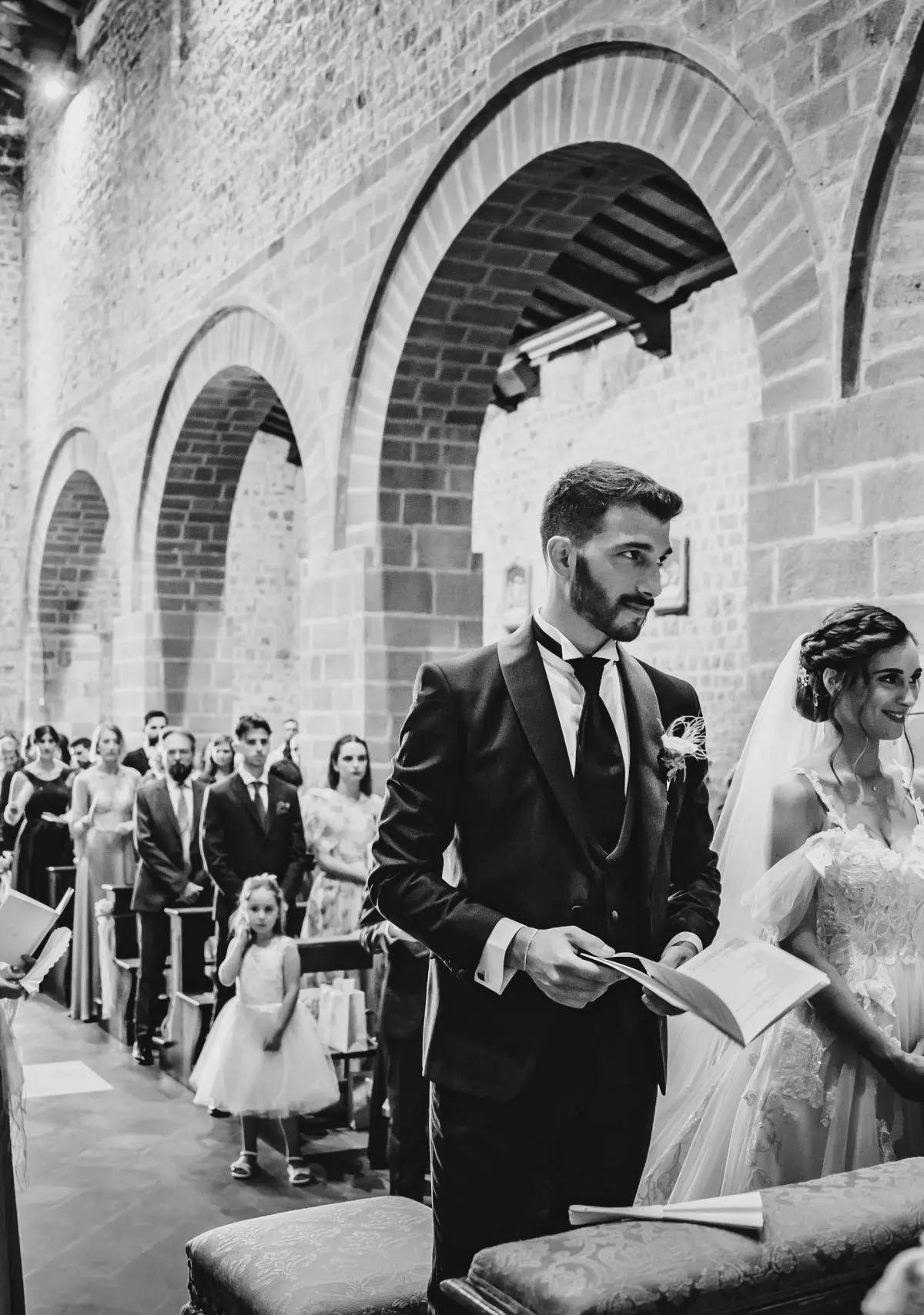 Vows under the loggia, the whole room turned toward them, Michele Monasta Photography, Florence, Italy
