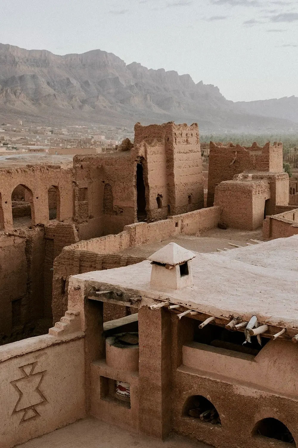 The rooftop terrace at sunrise, over the kasbah