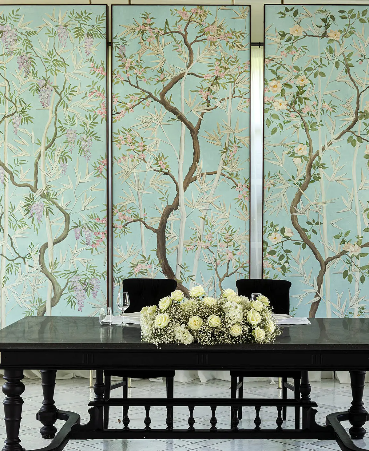 The chinoiserie dining room, set with a long table