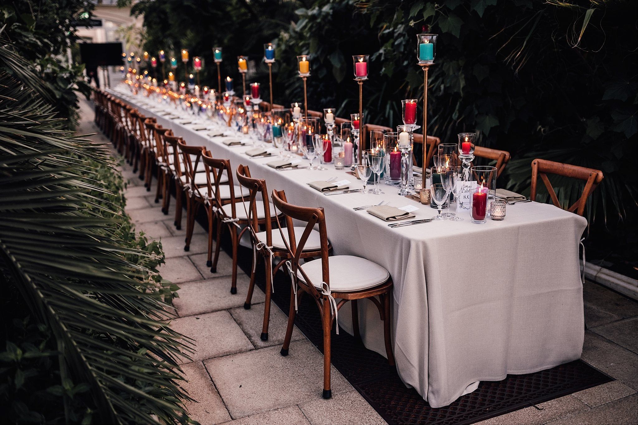 A wedding table dressed with orchid and hydrangea, the Temperate House, Kew Gardens