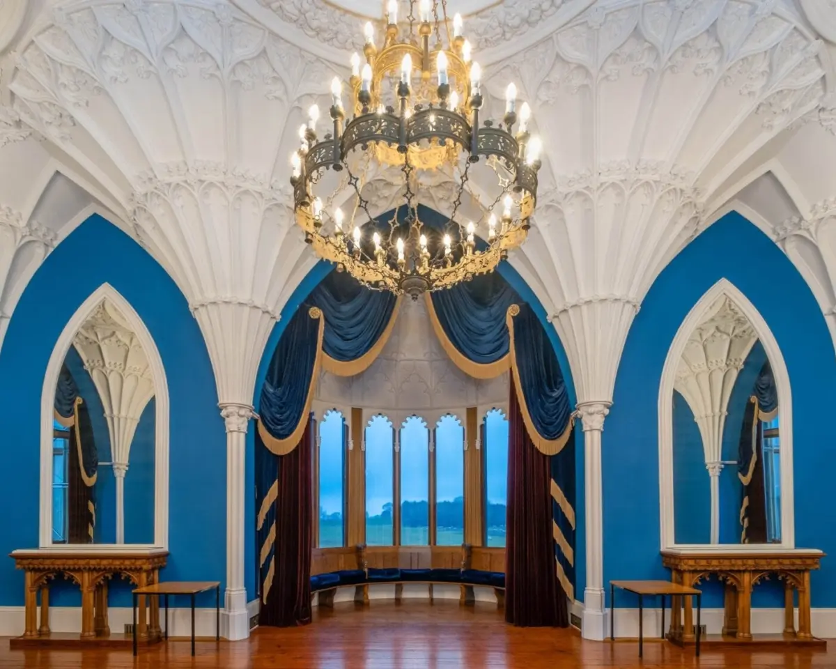 The vaulted Ballroom, blue Gothic arches and chandeliers