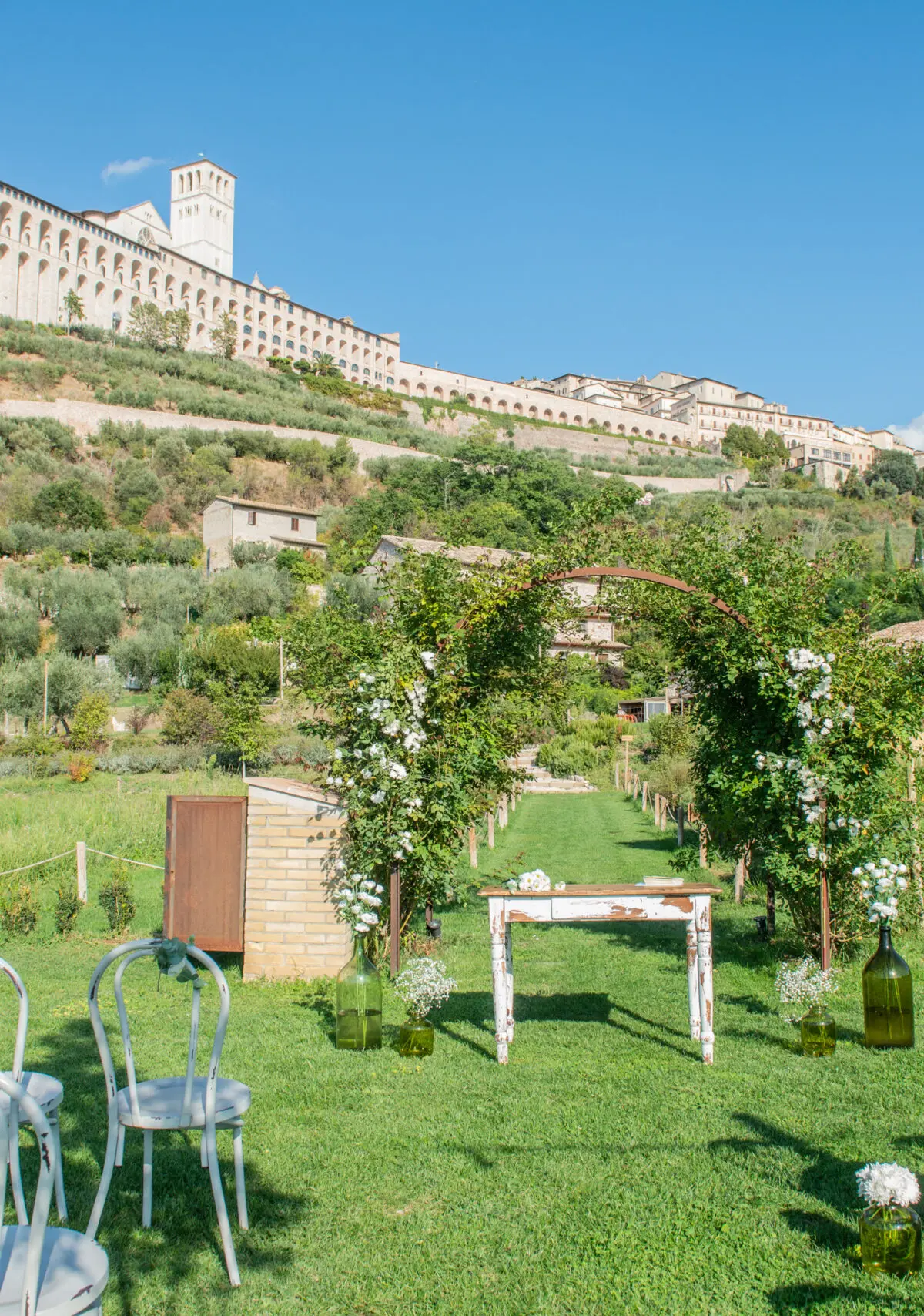 The panoramic pool at dusk at Borgo Antichi Orti Assisi