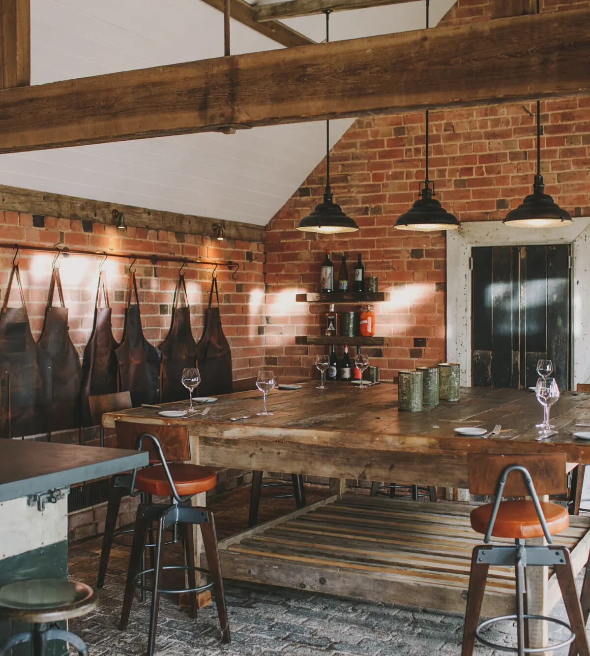 The Birches rustic ceremony barn, brick walls and exposed beams