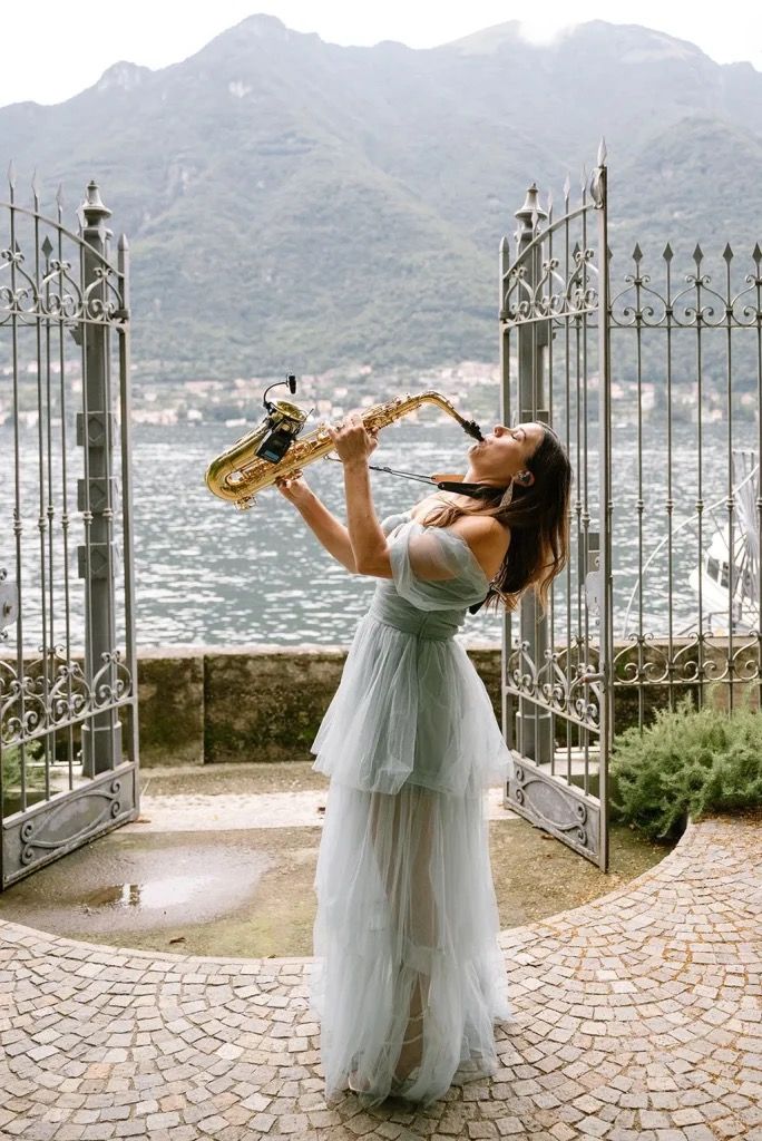 Aston Band saxophone player performing at a destination wedding