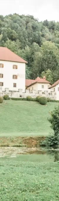 A couple by the lake at Štrmol Castle, Slovenia