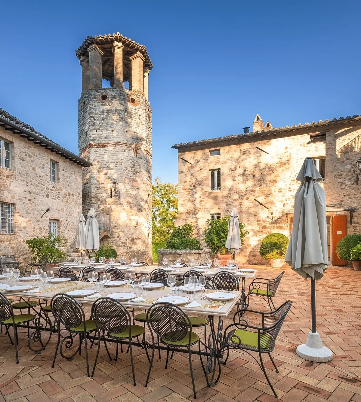 The inner courtyard of Pieve San Quirico Castle set for a wedding