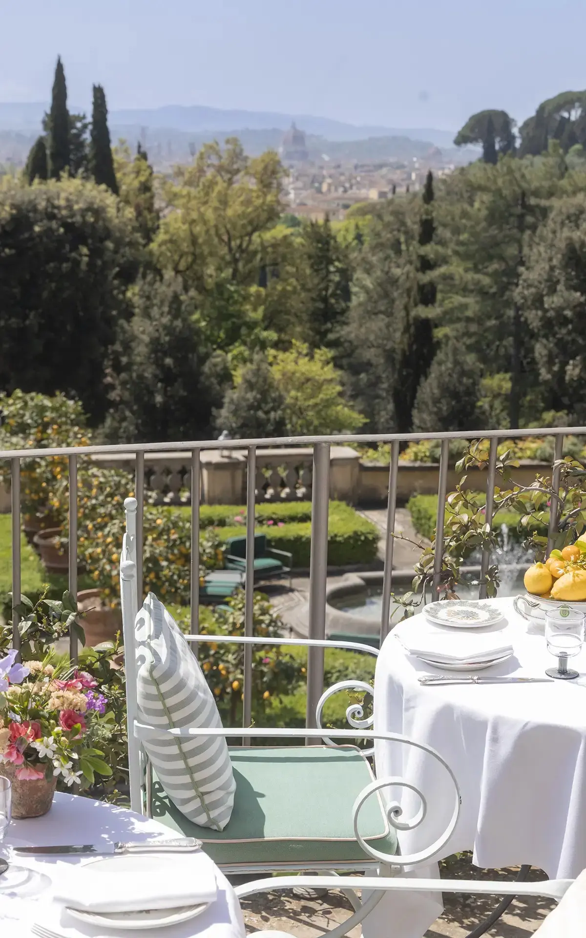 The terraced gardens and cypress trees at Il Salviatino, Florence panorama beyond